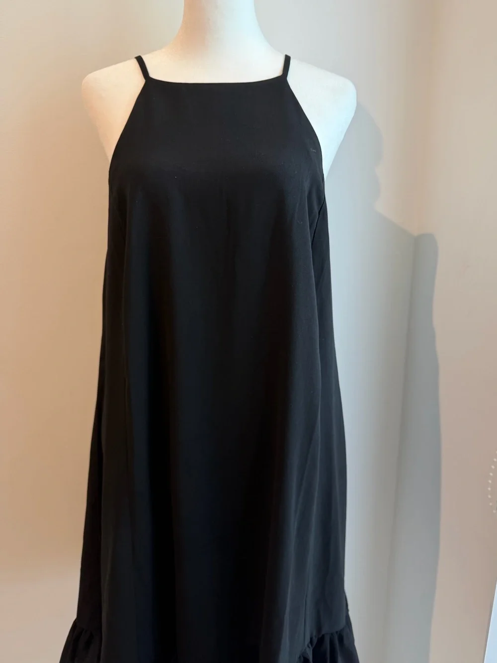 Sleeveless Black Ruffle-Hem Mini Dress - Picture 2 of 3